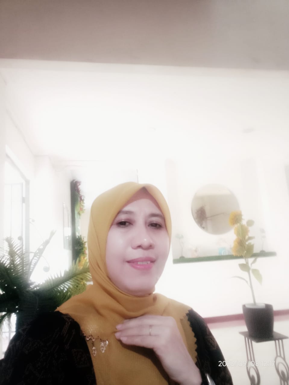 Dr. Hj. Dahlia Patiung, M.Pd.
